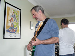 J.P. and Ray prepare to record some guitar solos