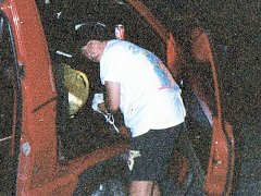 Paul fetching something from Todd's van